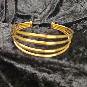 Gold toned 4 layer bracelet